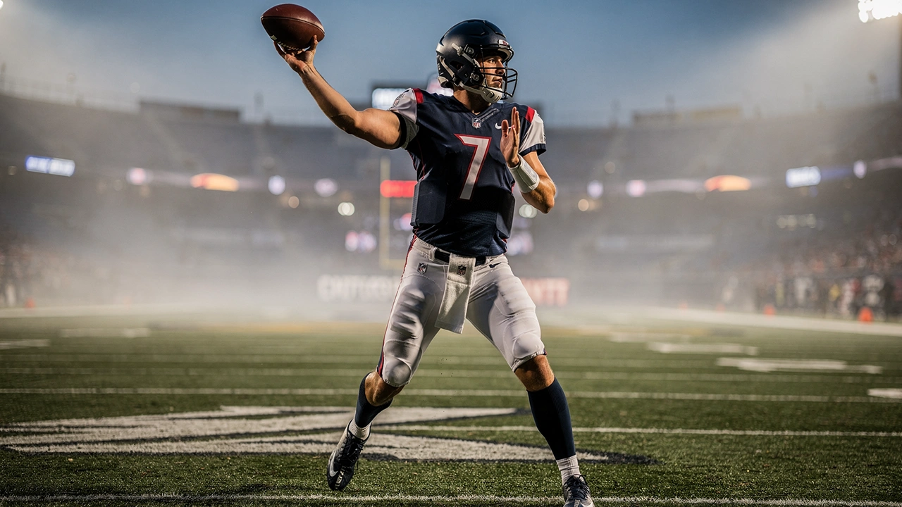 American-Football-Spieler beim Wurf auf dem Spielfeld unter Flutlicht